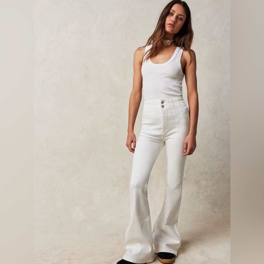 Free People. Size 26. Fit regular. Pure white pants. Used like new.